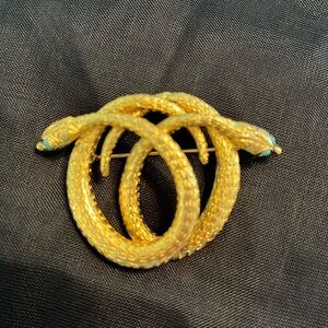 Vintage Snake Brooch Pin Goldtone with turquoise eyes.